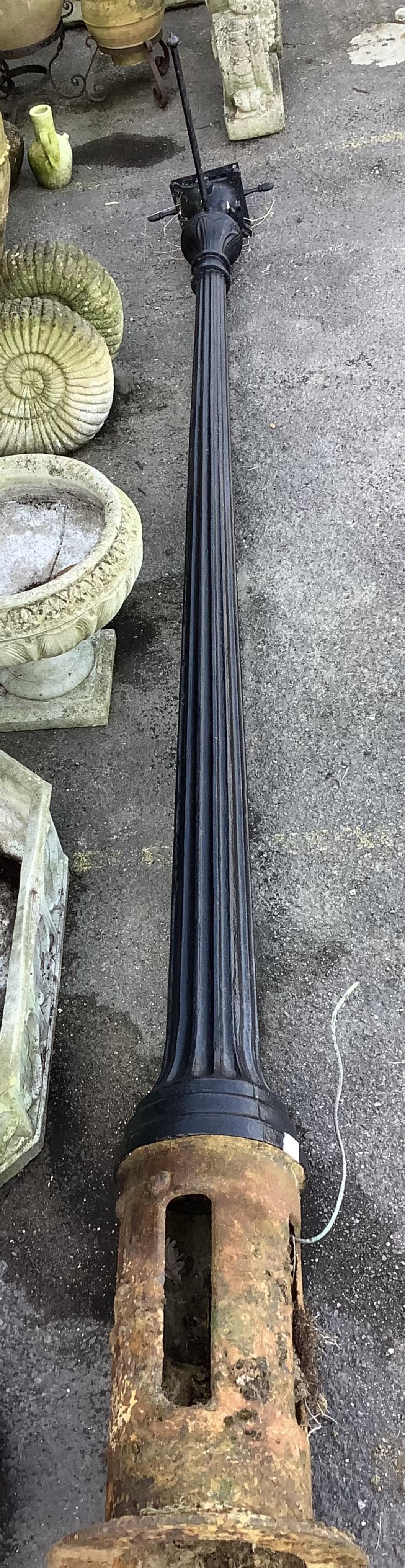 A Victorian style black painted cast iron street lamp, height including base 360cm. Condition - fair